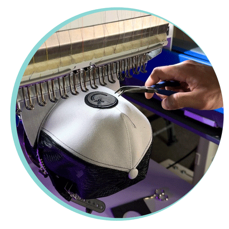 pufftimeline2 Person carefully removing excess foam from a hat after machine embroidery — step-by-step process in 3D puff embroidery to reveal clean, raised lettering underneath