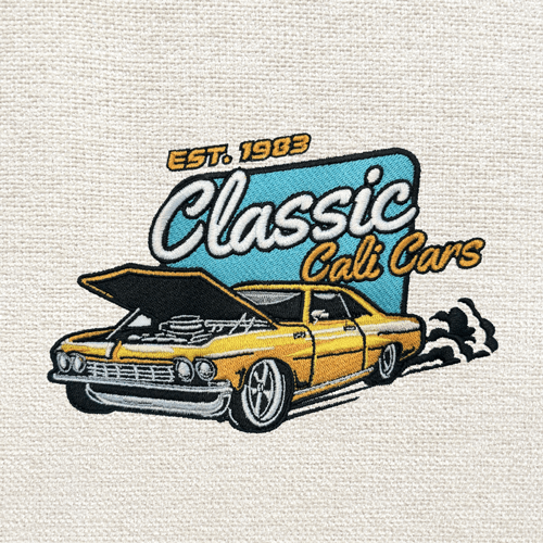 Custom embroidered logo of a vintage yellow muscle car with smoke effects and retro text “Classic Cali Cars – Est. 1983”, created using high-quality embroidery digitizing services for automotive branding.